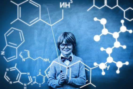 Študent je zobrazený s projekciou chemického väzbového atómu.