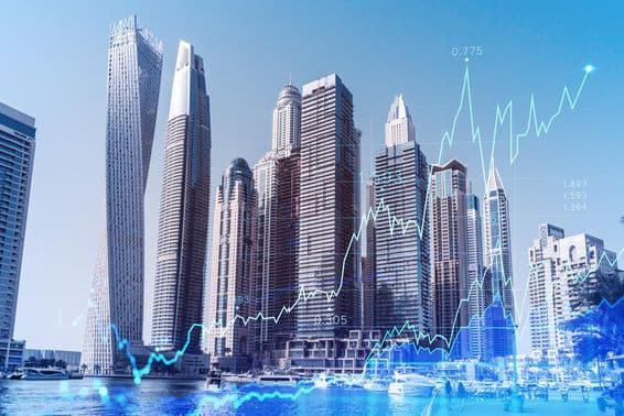 Dubajské obchodné centrum s prekrytím forexového grafu.