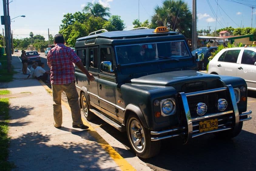 Land Rover Defender taxi.
