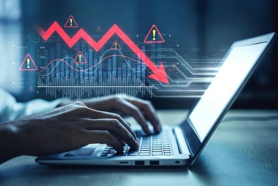Trhový graf, symboly alarmu a negatívne trendy v údajoch.